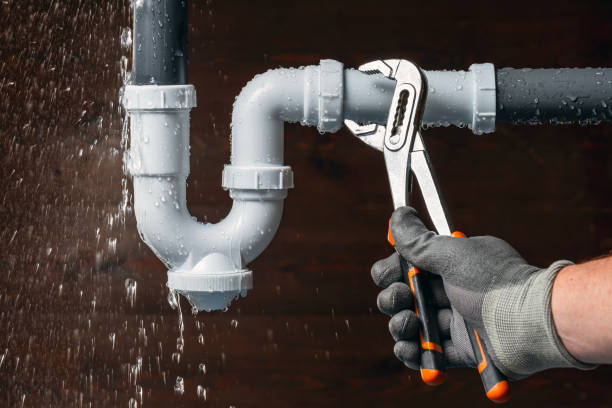 Professional Drain Cleaning technician working in Brooker, FL